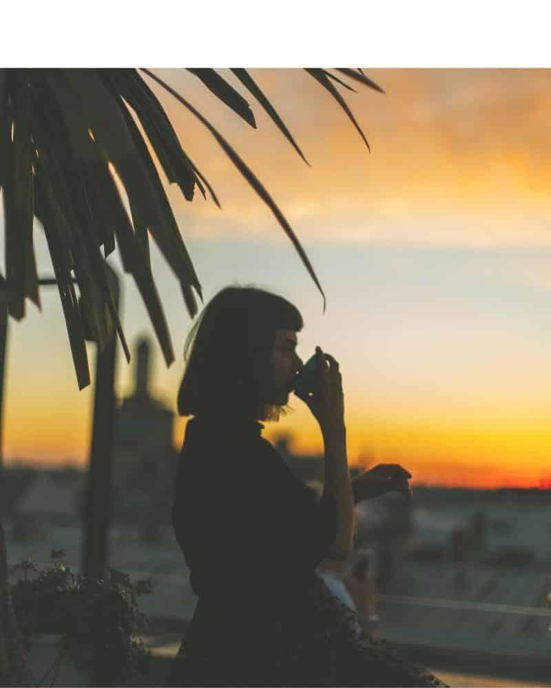 Uncommon and Curated Woman Drinking Coffee