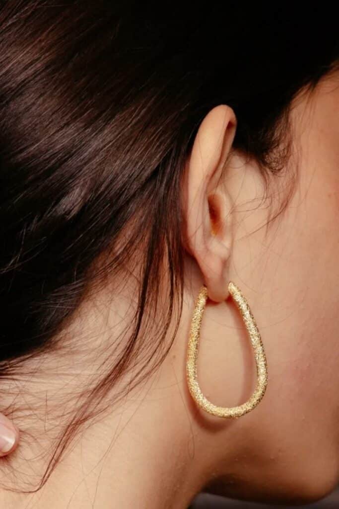Florentine Finish Small Drop Hoop Earrings by Carolina Bucci