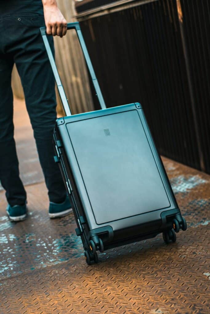 what to consider when buying a suitcase, compression straps, travel accessories, such a thing, travel tips, four wheels, car travel, luggage brands