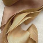 luxury brands using deadstock fabric